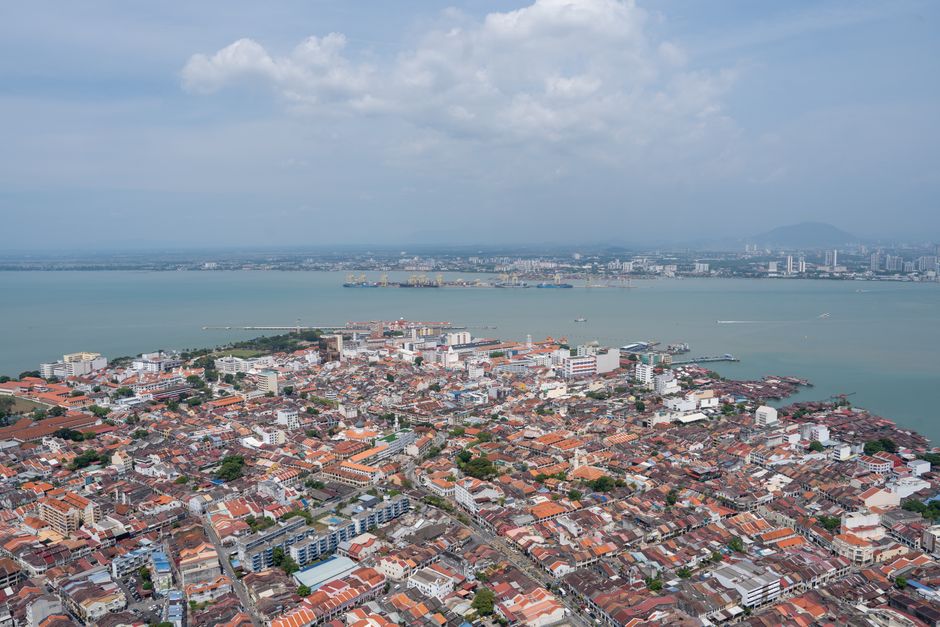 A breathtaking aerial view of Georgetown, Penang highlighting the urban landscape and coastline