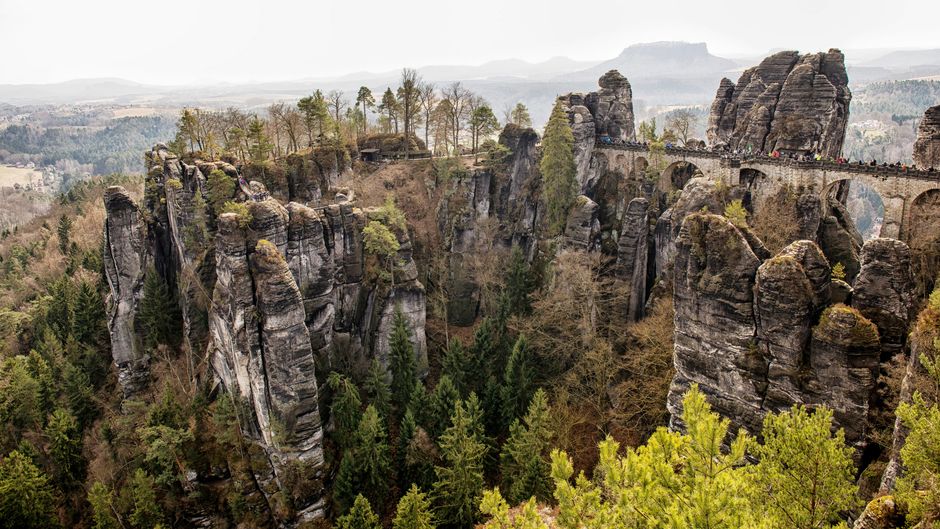 A stunning landscape of the Bastei Bridge and Elbe Sandstone Mountains in Saxony, Germany