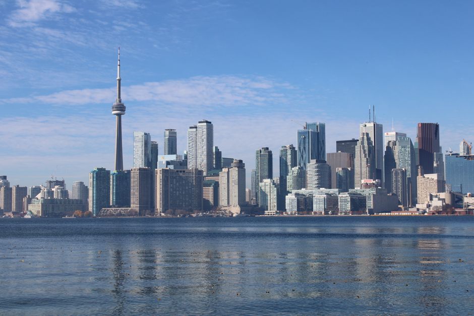 Beautiful skyline of Toronto featuring CN Tower and waterfront, captured on a sunny day