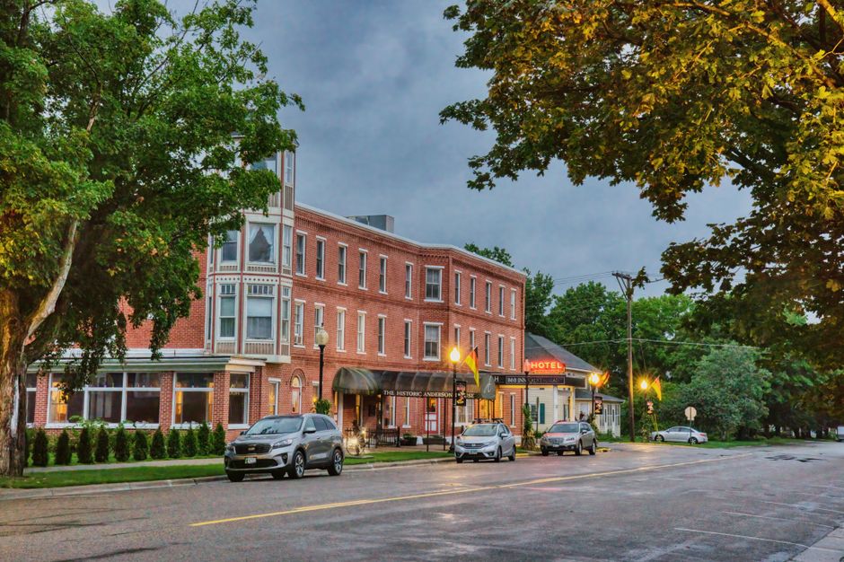 Scenic view of a historic Downtown building and street in Wabasha, MN with parked cars.