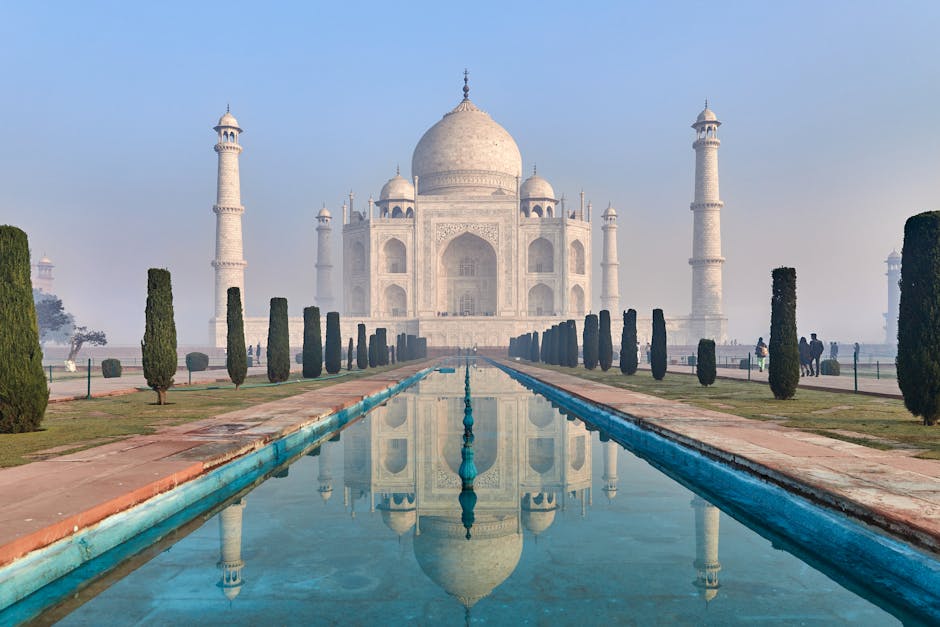 Captivating view of the iconic Taj Mahal reflecting in the water, showcasing its architectural beauty.