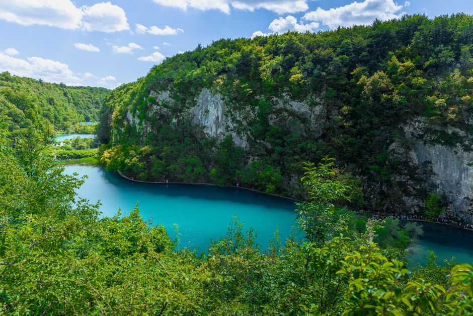 Discover the stunning turquoise waters and lush greenery of Plitvice Lakes National Park in Croatia