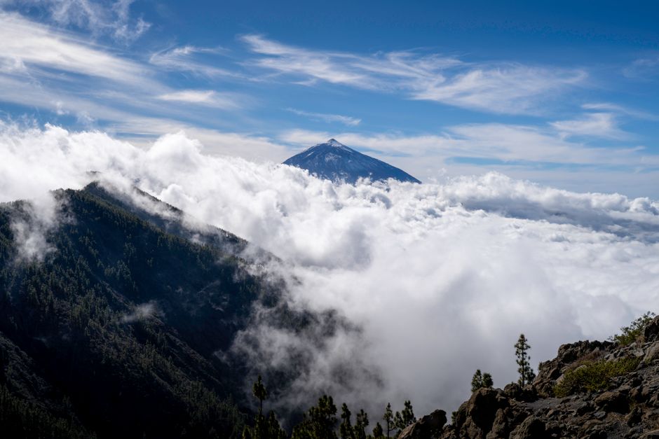 Majestic view of Mount Teide surrounded by clouds in the Canary Islands