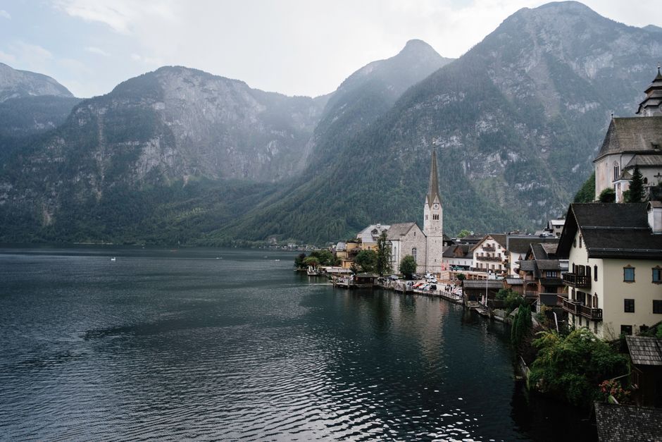 Picturesque Hallstatt village nestled by the lake with alpine backdrop