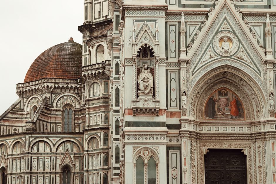 Close-up of Florence Cathedral showcasing detailed Gothic architecture and beautiful mosaics.
