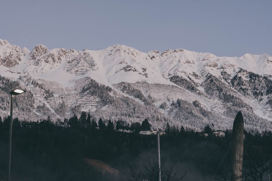 Scenic view of snow-covered mountains under a clear blue sky in Austria