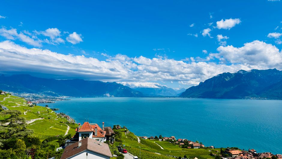 Stunning aerial view of Lake Geneva, vineyards, and mountains from Chexbres, Switzerland