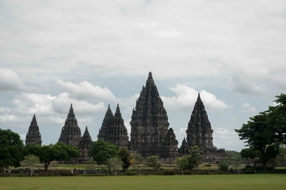 Stunning view of the Prambanan Temple complex under a cloudy sky in Indonesia